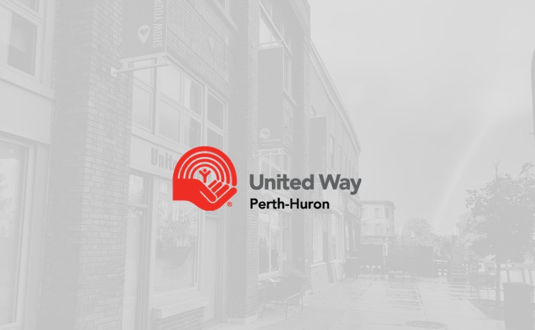 united way perth-huron logo with picture of united centre in stratford